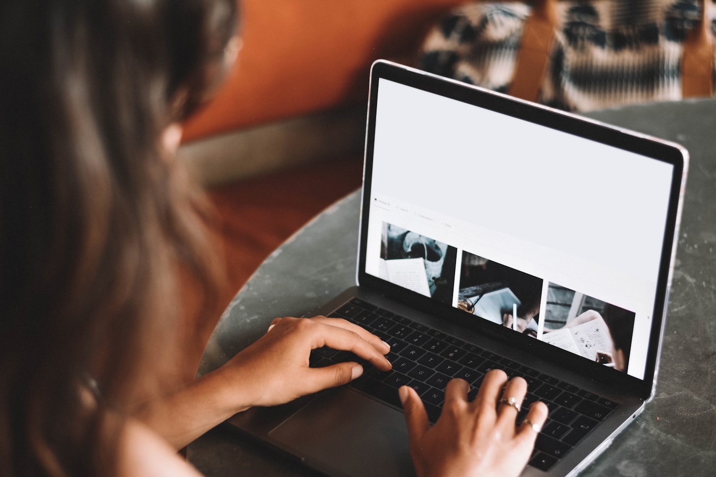 A digital nomad woman working on her laptop